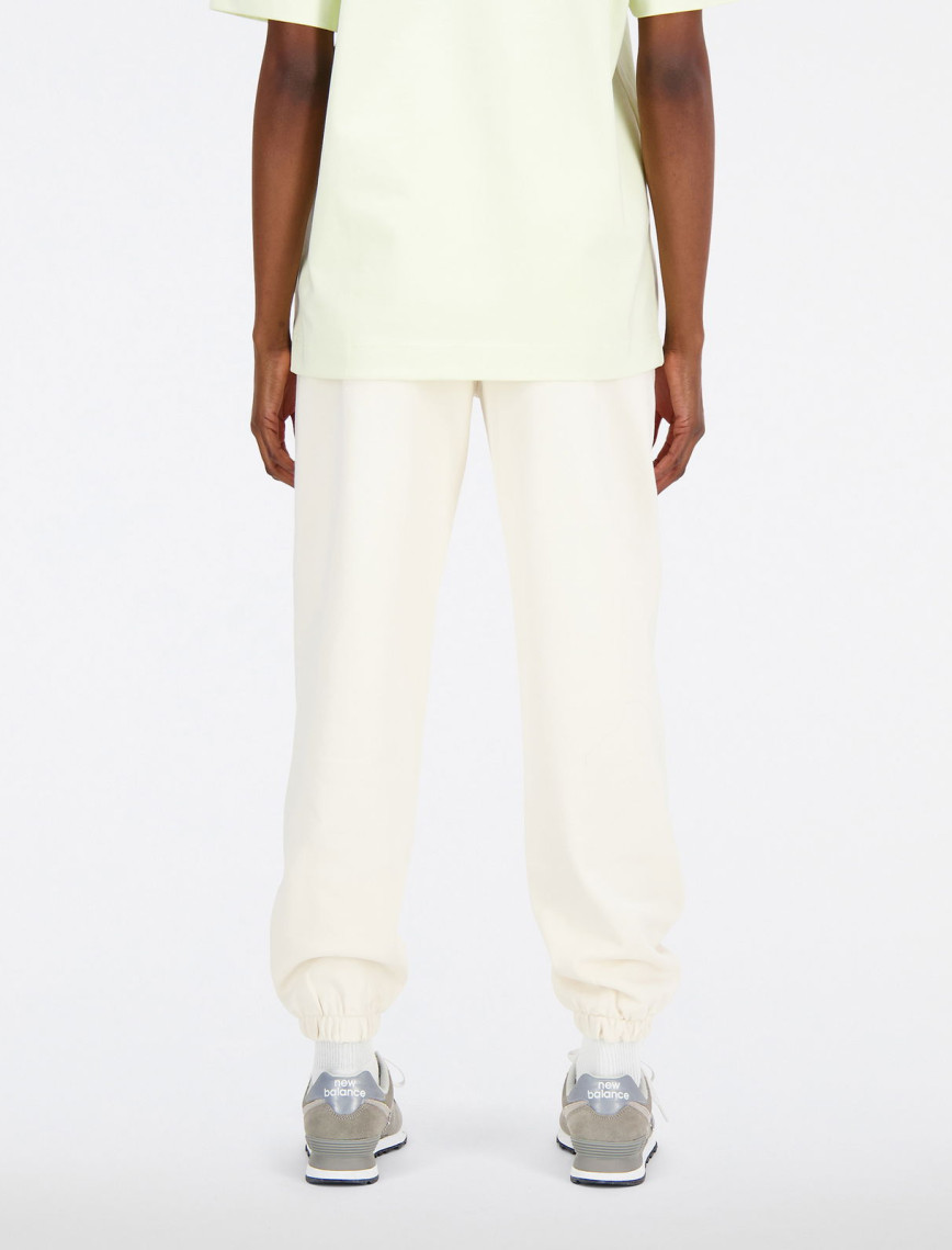 New Balance Athletics Linear Kadın Bej Eşofman Altı New Balance Athletics Linear Kadın Bej Eşofman Altı