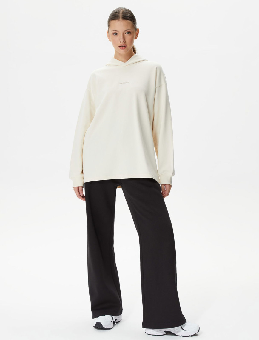 New Balance Athletics Linear Kadın Bej Hoodie New Balance Athletics Linear Kadın Bej Hoodie