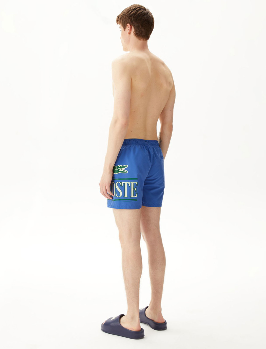 Lacoste Baskılı Erkek Mavi Deniz Şortu Lacoste Baskılı Erkek Mavi Deniz Şortu