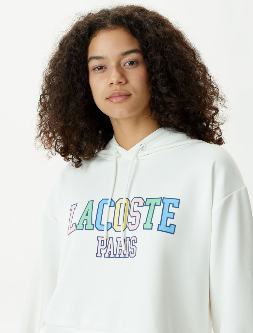 Lacoste Kadın Relaxed Fit Kapüşonlu Baskılı Beyaz Sweatshirt Lacoste Kadın Relaxed Fit Kapüşonlu Baskılı Beyaz Sweatshirt