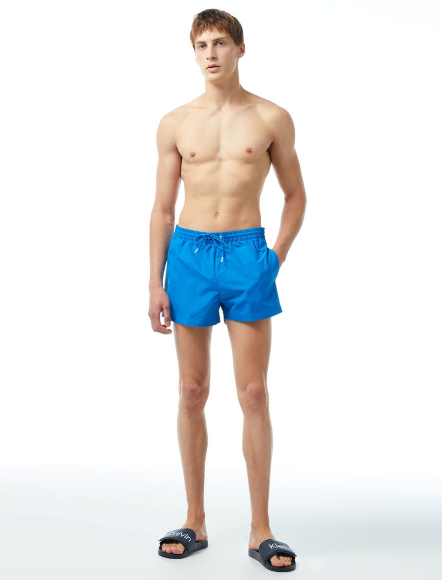 Calvin Klein Core Logo Tape Erkek Mavi Deniz Şortu Calvin Klein Core Logo Tape Erkek Mavi Deniz Şortu