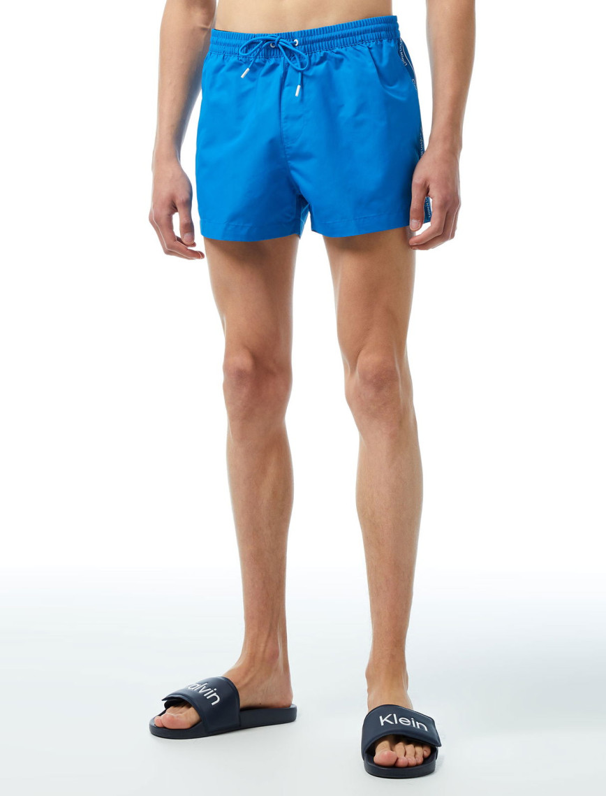 Calvin Klein Core Logo Tape Erkek Mavi Deniz Şortu Calvin Klein Core Logo Tape Erkek Mavi Deniz Şortu