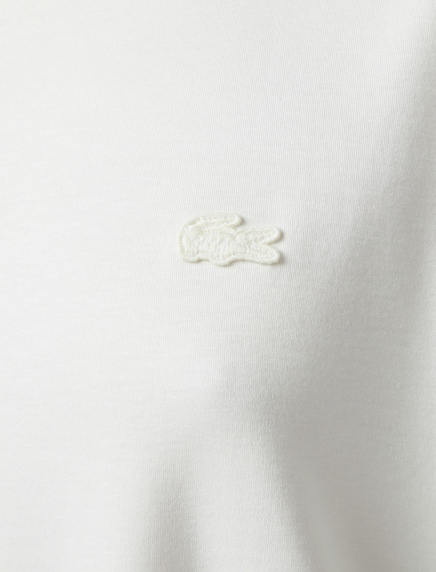 Lacoste Kadın Relaxed Fit Bisiklet Yaka Koyu Beyaz T-Shirt Lacoste Kadın Relaxed Fit Bisiklet Yaka Koyu Beyaz T-Shirt