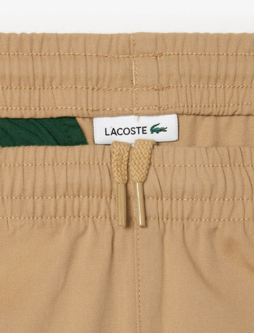 Lacoste Çocuk Regular Fit Bej Pantolon Lacoste Çocuk Regular Fit Bej Pantolon