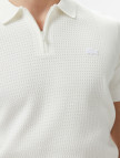 Lacoste Erkek Kısa Kollu Yarım Fermuarlı Beyaz Triko Lacoste Erkek Kısa Kollu Yarım Fermuarlı Beyaz Triko
