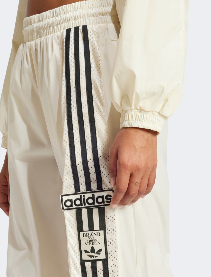 adidas AdiBreak Woven Two-In-One Kadın Krem Eşofman Altı adidas AdiBreak Woven Two-In-One Kadın Krem Eşofman Altı