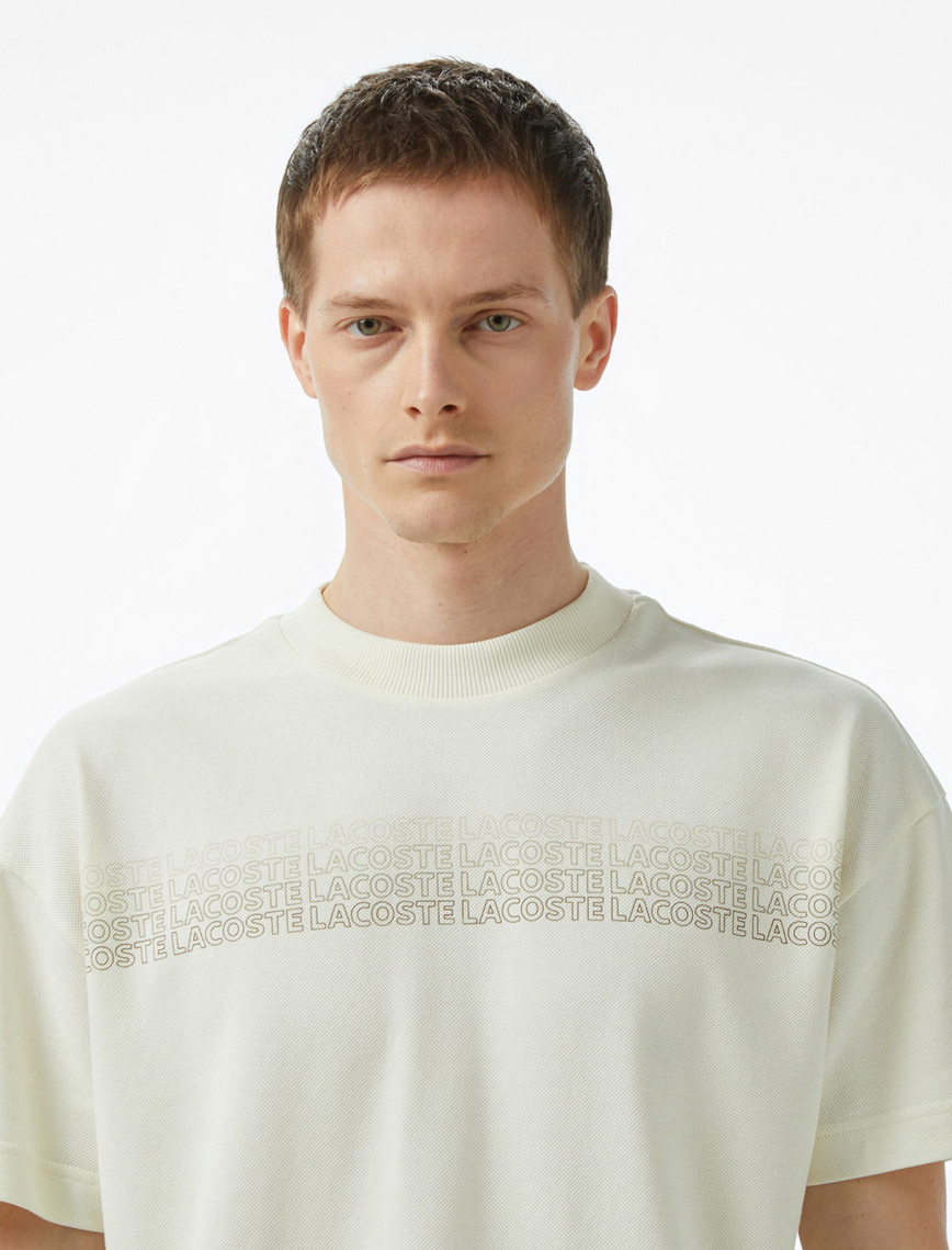 Lacoste Erkek Oversize Fit Bisiklet Yaka Baskılı Beyaz T-Shirt Lacoste Erkek Oversize Fit Bisiklet Yaka Baskılı Beyaz T-Shirt