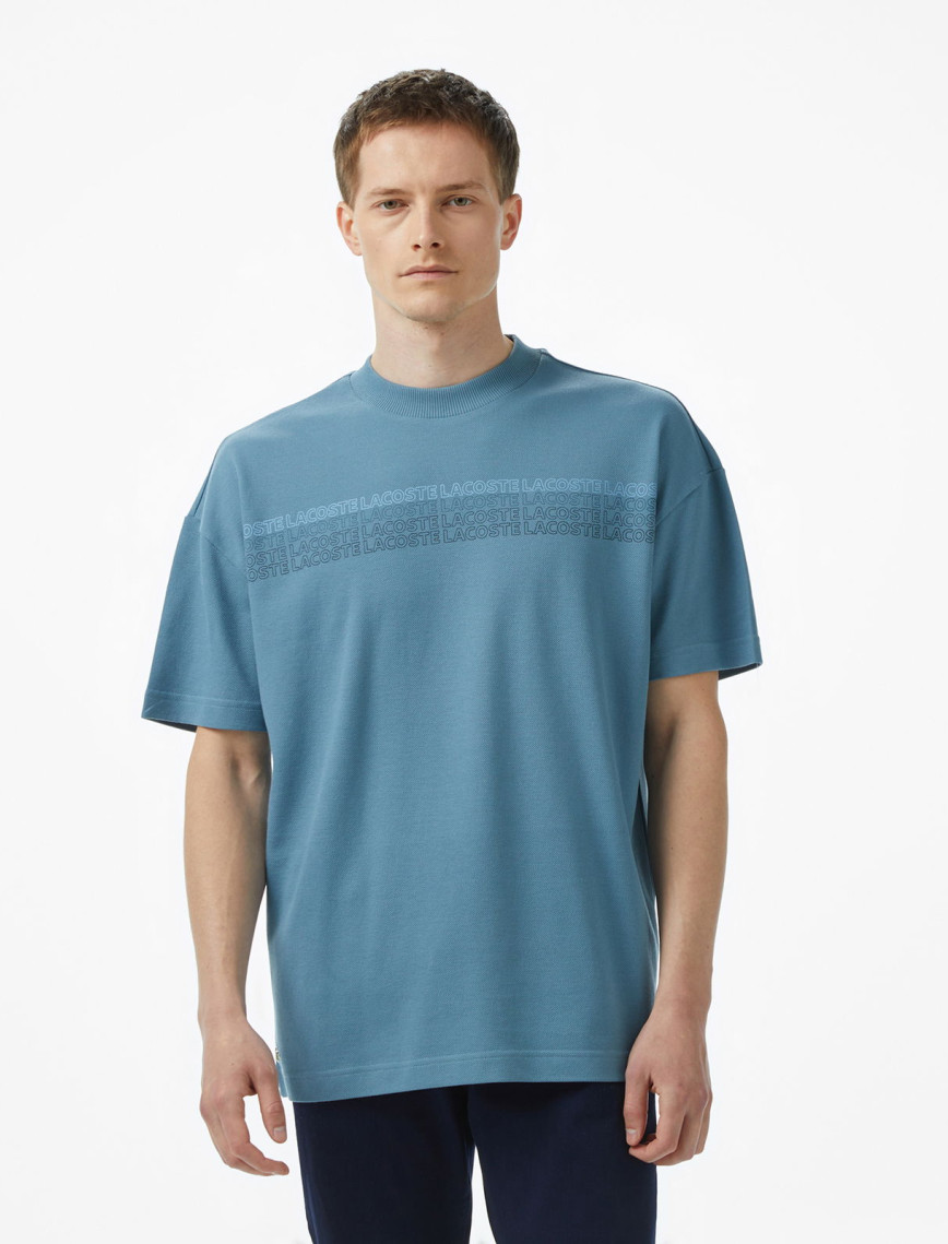 Lacoste Erkek Oversize Fit Bisiklet Yaka Baskılı Beyaz T-Shirt Lacoste Erkek Oversize Fit Bisiklet Yaka Baskılı Beyaz T-Shirt