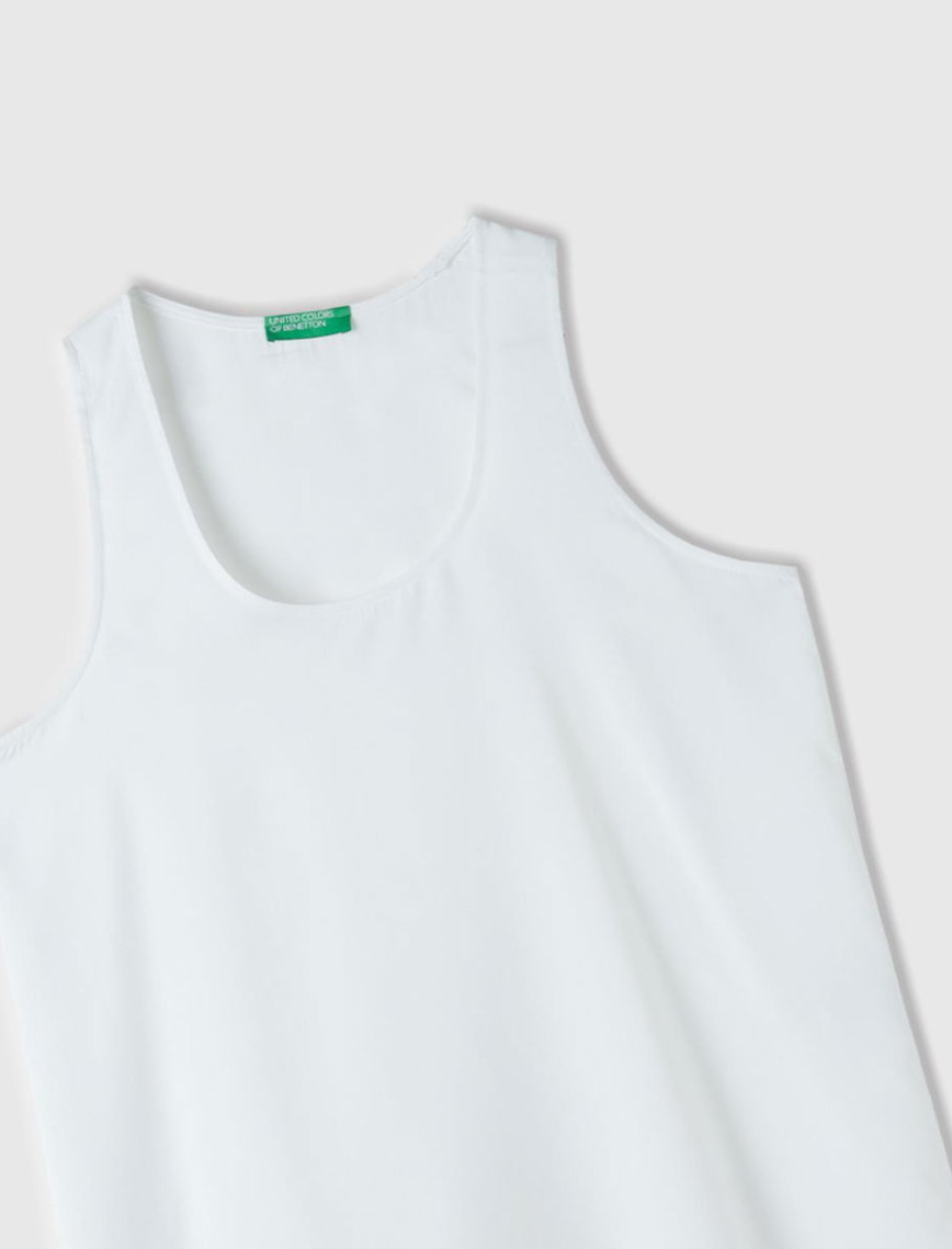 Kadın Bej %100 Viskoz Dekoratif Dikişli Geniş Bisiklet Yaka Kolsuz Bluz Kadın Bej %100 Viskoz Dekoratif Dikişli Geniş Bisiklet Yaka Kolsuz Bluz