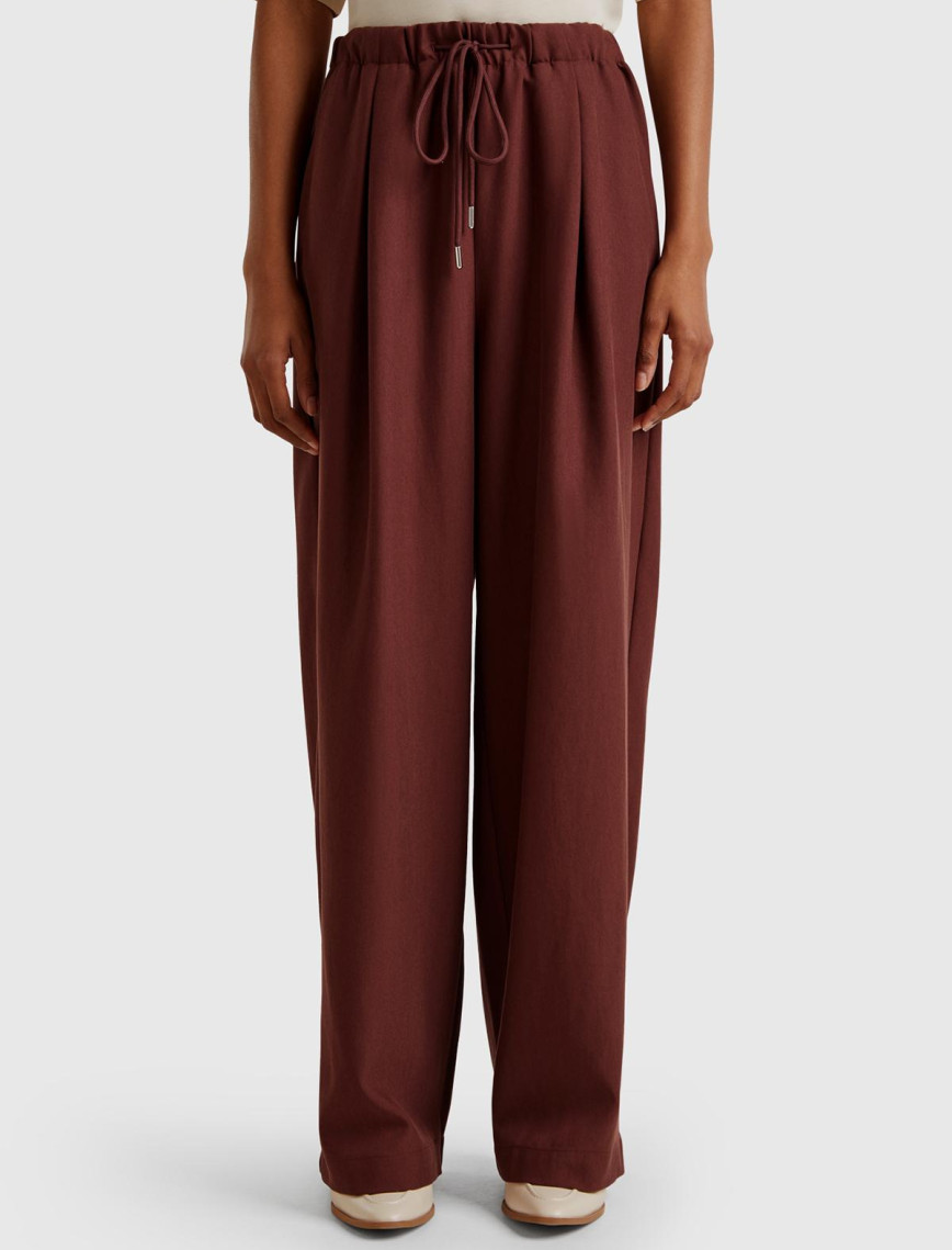 Kadın Kahverengi Liyosel Karışımlı Beli Lastikli Geniş Paça Pantolon Kadın Kahverengi Liyosel Karışımlı Beli Lastikli Geniş Paça Pantolon