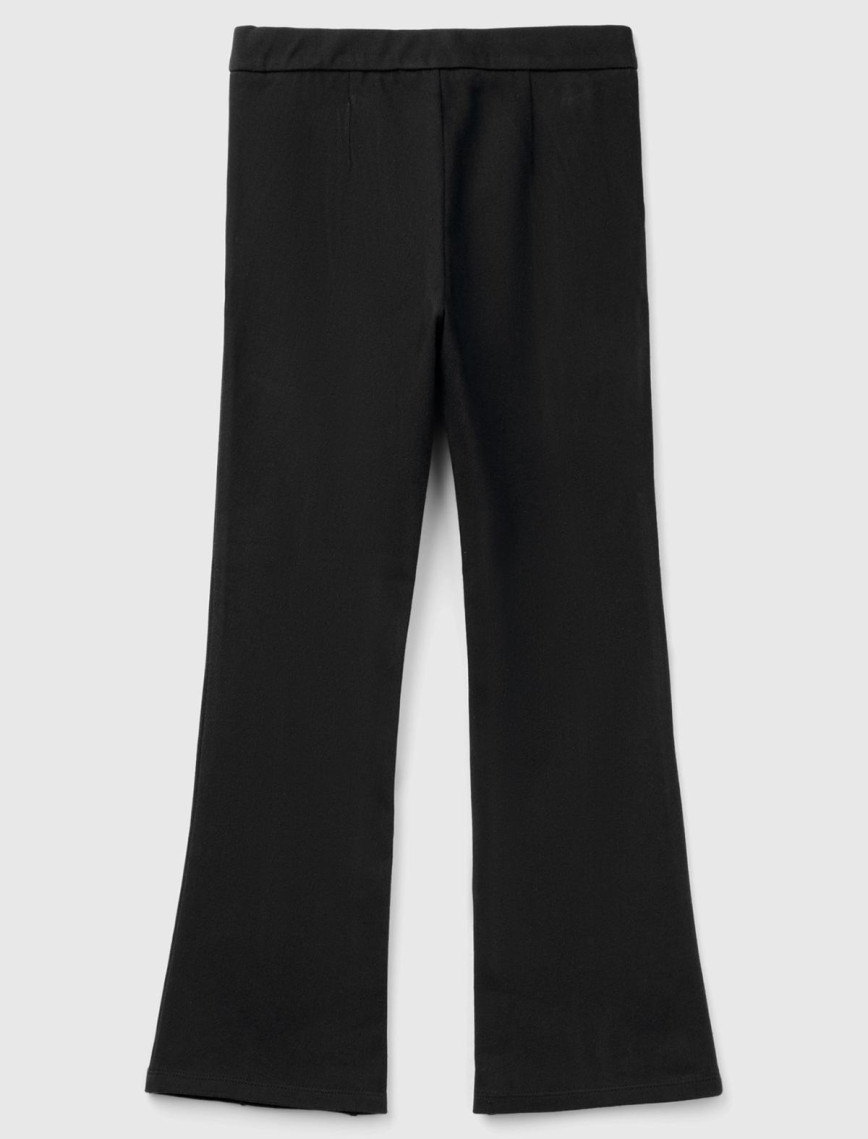 Kız Çocuk Siyah Fermuarlı ve Düğmeli Arkası Pileli Geniş Paça Pantolon Kız Çocuk Siyah Fermuarlı ve Düğmeli Arkası Pileli Geniş Paça Pantolon