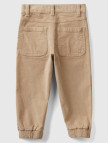 Erkek Çocuk Bej Arka Cebi Logo Detaylı Lastik Paça Kadife Pantolon Erkek Çocuk Bej Arka Cebi Logo Detaylı Lastik Paça Kadife Pantolon