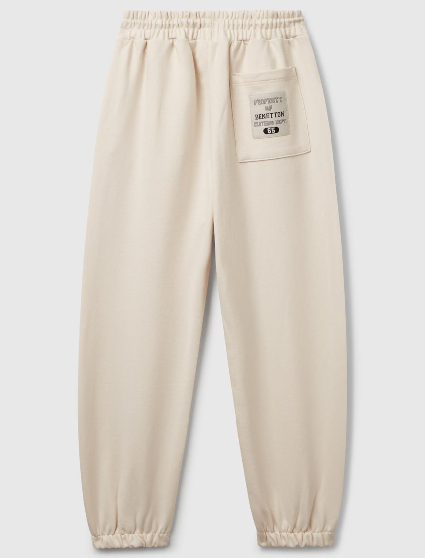 Erkek Çocuk Krem Logolu Arka Cep Detaylı Beli Lastikli Manşetli Eşofman Altı Erkek Çocuk Krem Logolu Arka Cep Detaylı Beli Lastikli Manşetli Eşofman Altı