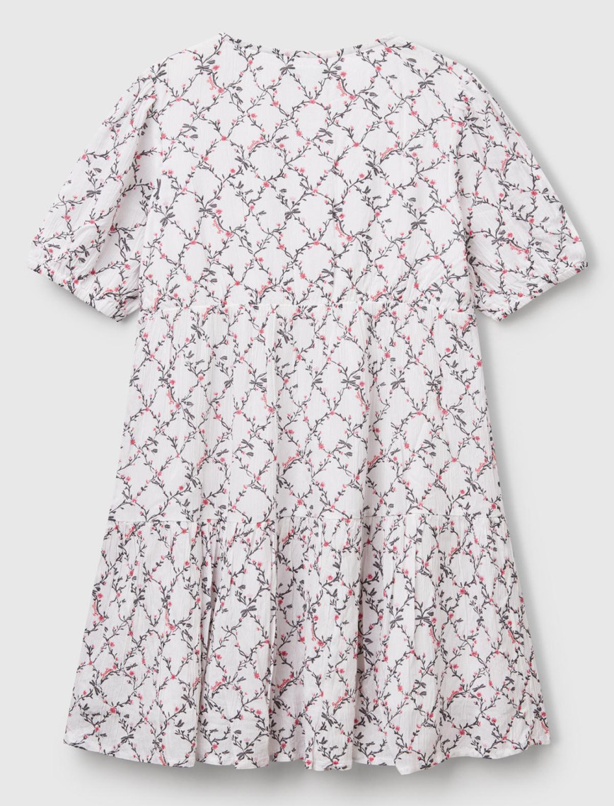 Kız Çocuk Beyaz Mix Viskozlu Desenli Önü Düğmeli Pileli Katlı Kısa Kollu Elbise Kız Çocuk Beyaz Mix Viskozlu Desenli Önü Düğmeli Pileli Katlı Kısa Kollu Elbise