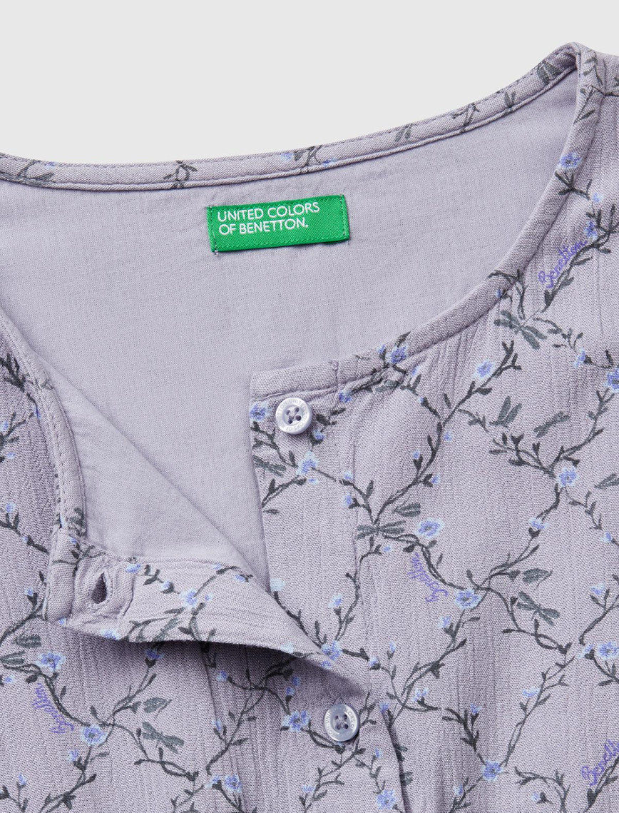 Kız Çocuk Mor Viskozlu Desenli Önü Düğmeli Pileli Katlı Kısa Kollu Elbise Kız Çocuk Mor Viskozlu Desenli Önü Düğmeli Pileli Katlı Kısa Kollu Elbise