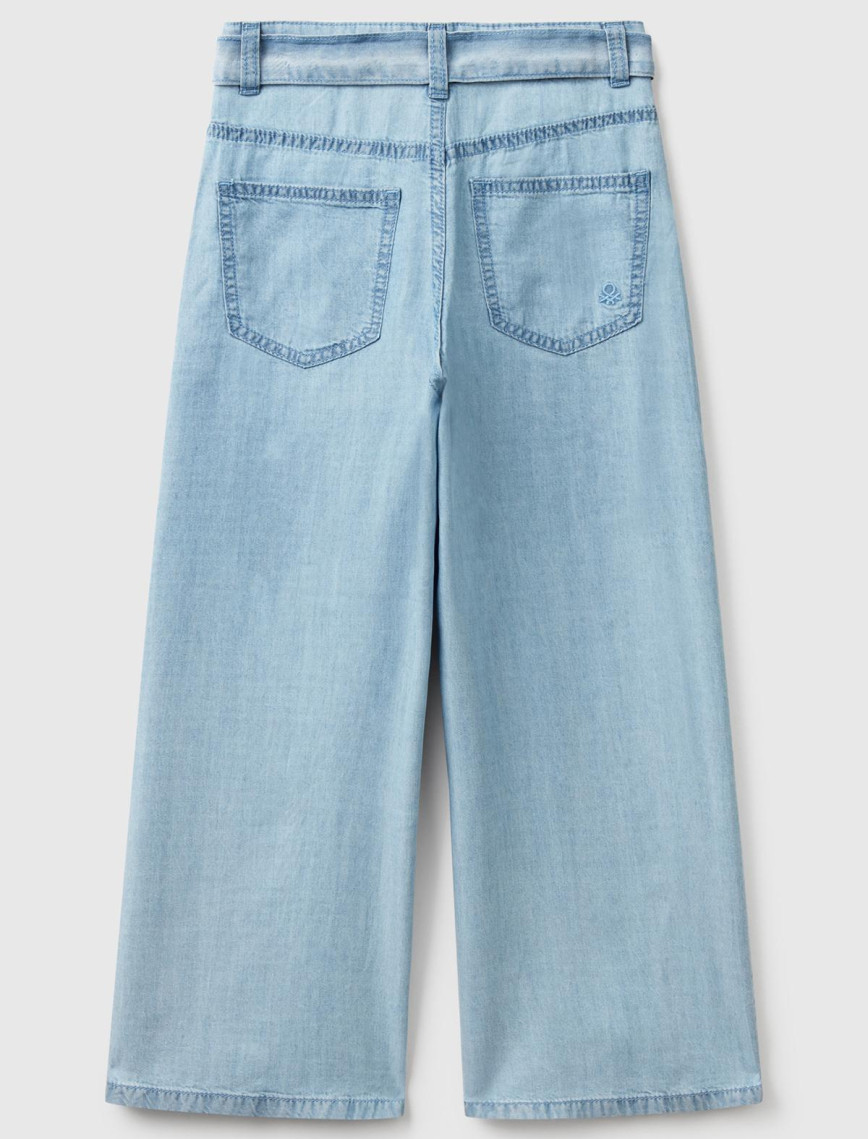 Kız Çocuk Açık Denim %100 Liyosel Beli Kuşaklı Wide Fit Denim Pantolon Kız Çocuk Açık Denim %100 Liyosel Beli Kuşaklı Wide Fit Denim Pantolon