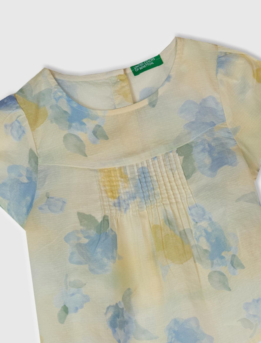 Kız Çocuk Sarı Mavi Tamamı Desenli Arkası Düğmeli Pileli Müslin Bluz Kız Çocuk Sarı Mavi Tamamı Desenli Arkası Düğmeli Pileli Müslin Bluz