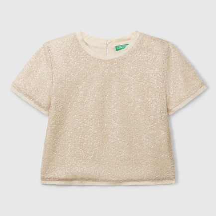 Kız Çocuk Ekru Payetli Tül Astarlı Arkası Tek Düğmeli Kısa Kollu Bluz Kız Çocuk Ekru Payetli Tül Astarlı Arkası Tek Düğmeli Kısa Kollu Bluz