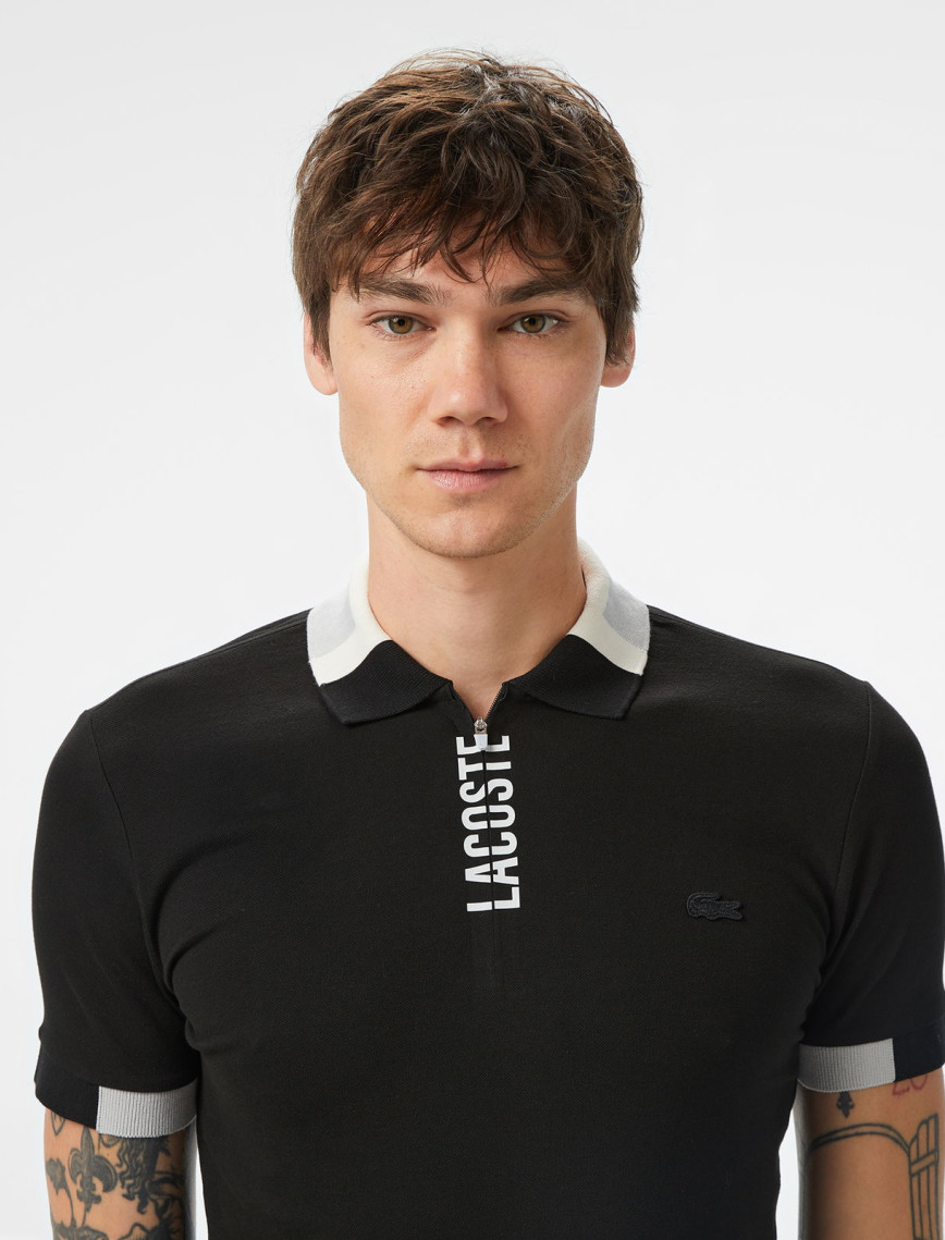 Lacoste Erkek Regular Fit Yarım Fermuarlı Baskılı Siyah Polo Lacoste Erkek Regular Fit Yarım Fermuarlı Baskılı Siyah Polo