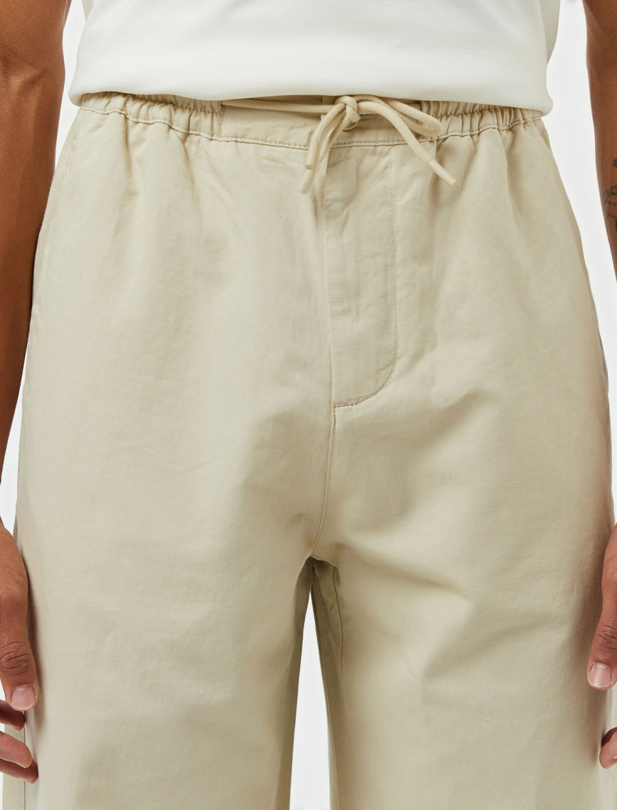 Lacoste Erkek Relaxed Fit Bej Pantolon Lacoste Erkek Relaxed Fit Bej Pantolon