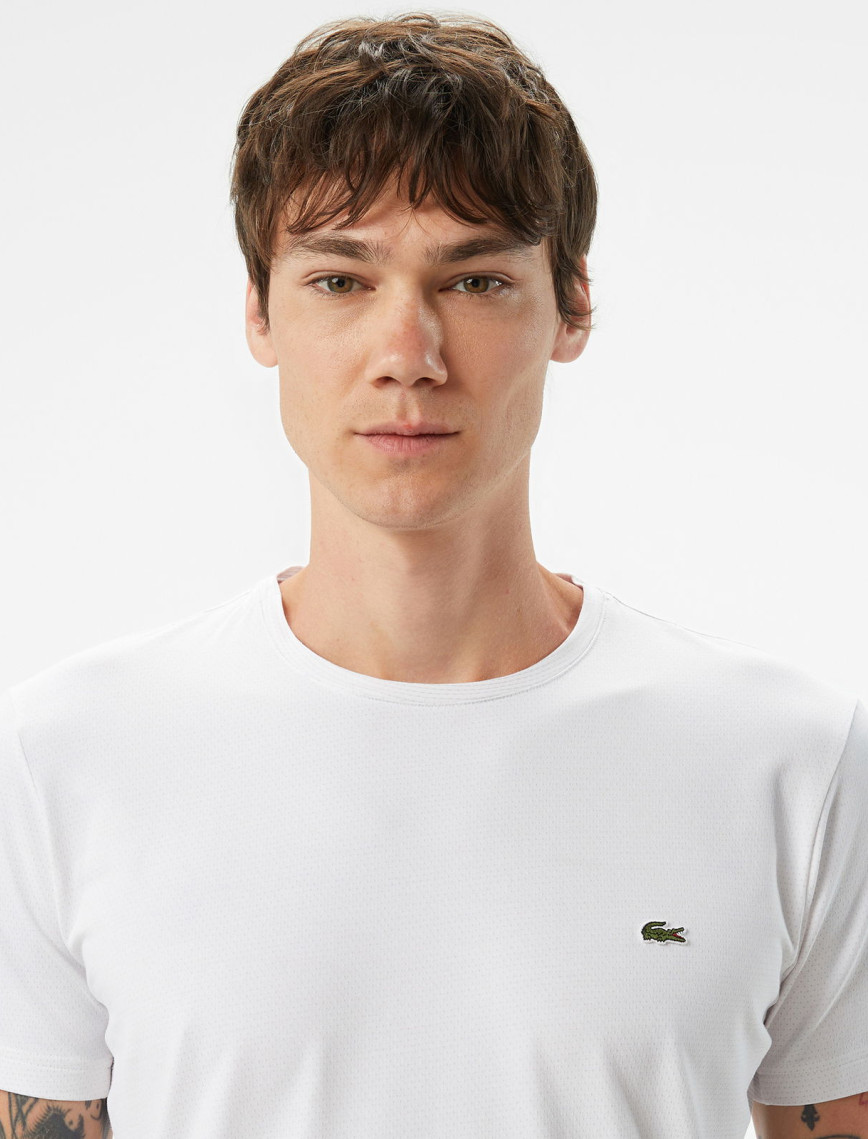 Lacoste Erkek Slim Fit Bisiklet Yaka Beyaz T-Shirt Lacoste Erkek Slim Fit Bisiklet Yaka Beyaz T-Shirt