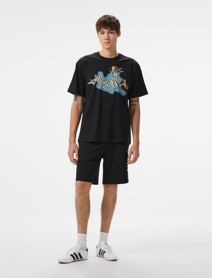 Karl Kani Woven Signature Airbush Amor Erkek Siyah T-Shirt Karl Kani Woven Signature Airbush Amor Erkek Siyah T-Shirt