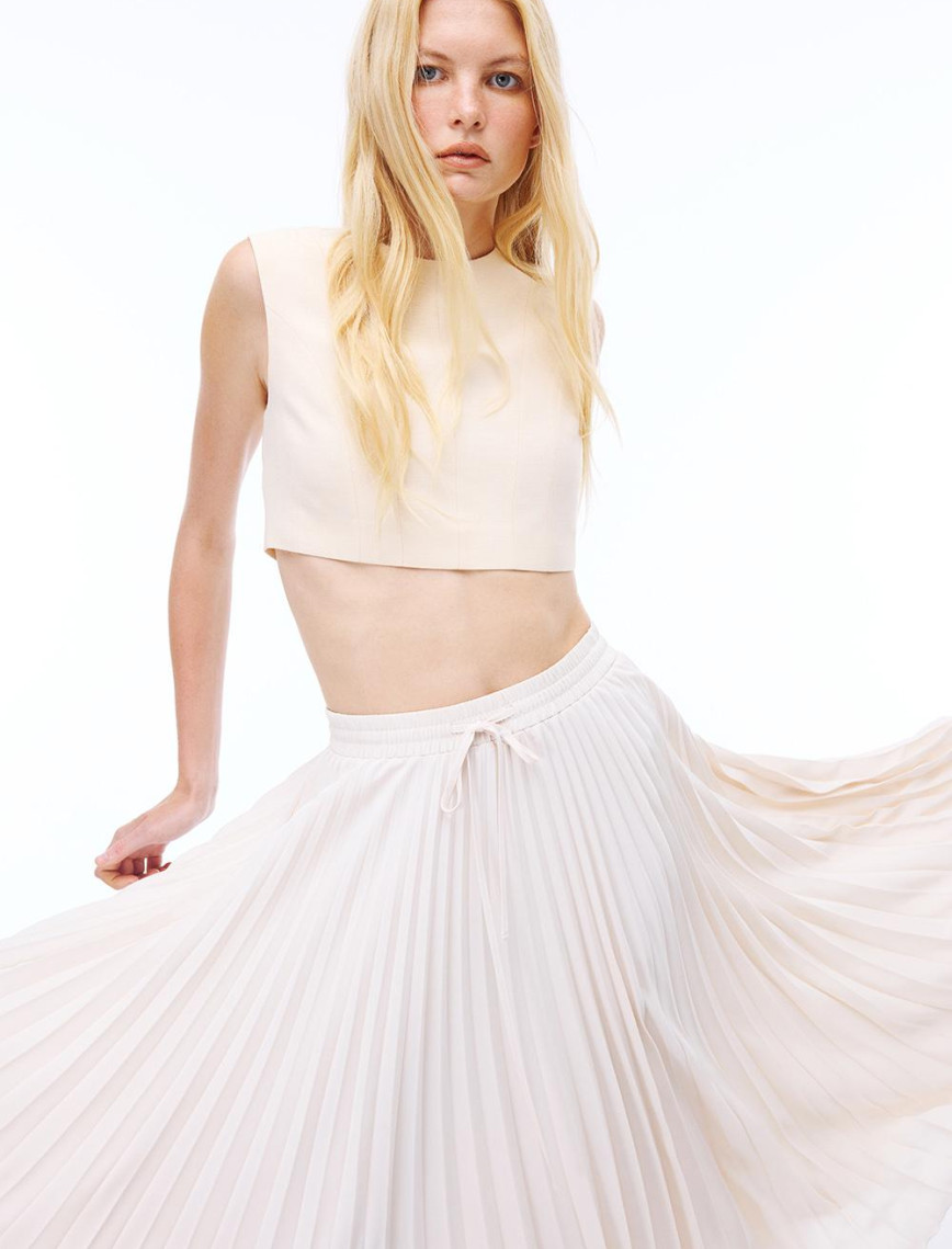 Seras Regular Fit Sıfır Kol Yuvarlak Yaka Bej Renk Kadın Bluz Seras Regular Fit Sıfır Kol Yuvarlak Yaka Bej Renk Kadın Bluz