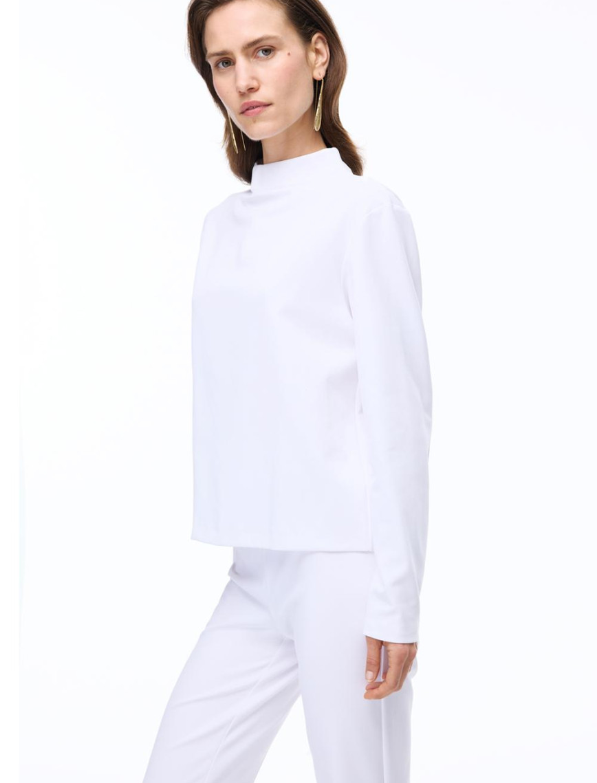 Animas Slim Fit Kısa Boy Düşük Kollu Yarım Dik Yaka Beyaz Bluz Animas Slim Fit Kısa Boy Düşük Kollu Yarım Dik Yaka Beyaz Bluz