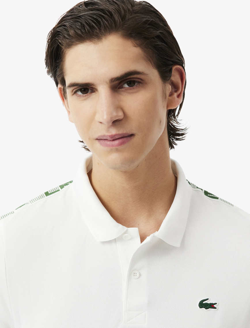 Lacoste SPORT Erkek Regular Fit Baskılı Beyaz Polo Lacoste SPORT Erkek Regular Fit Baskılı Beyaz Polo