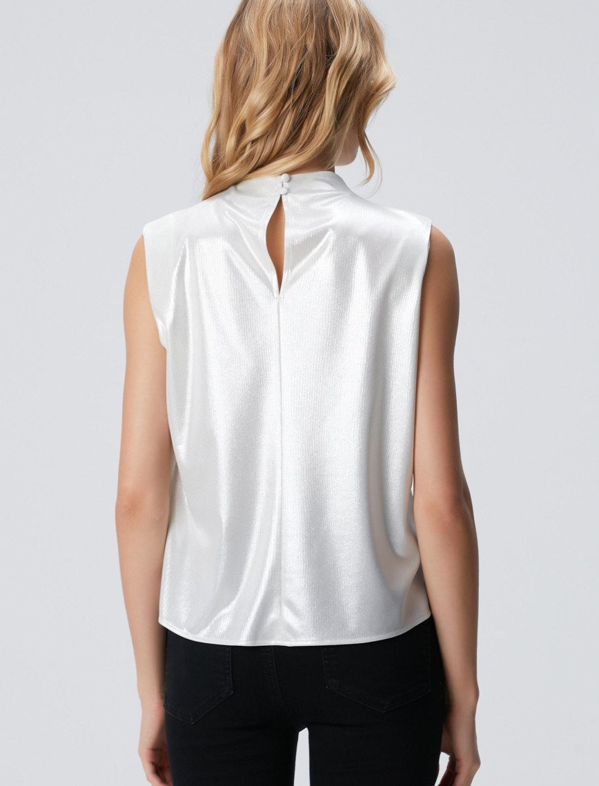 Network Kadın Açık Bej Dik Yaka Kolsuz Drape Detaylı Bluz Network Kadın Açık Bej Dik Yaka Kolsuz Drape Detaylı Bluz