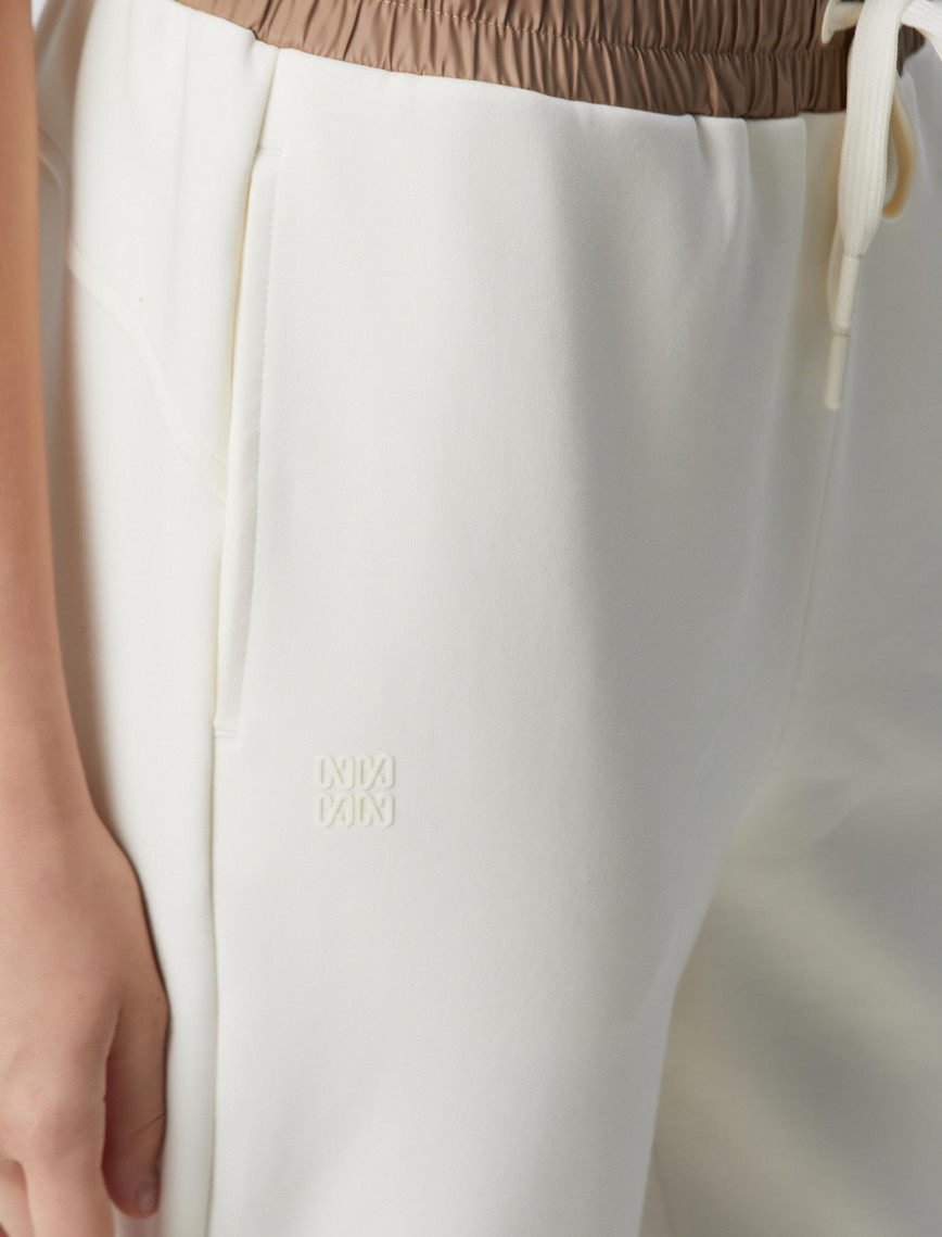 Network Kadın Kırık Beyaz N-Tech Dokuma Garnili Örme Eşofman Network Kadın Kırık Beyaz N-Tech Dokuma Garnili Örme Eşofman