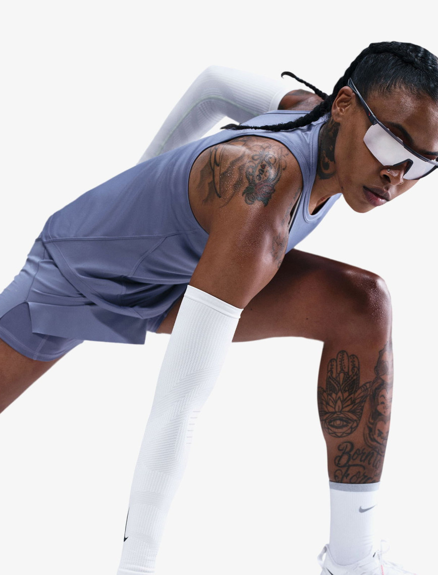 Nike Dri-Fit Tempo Swoosh Run Kadın Mavi Kolsuz T-Shirt Nike Dri-Fit Tempo Swoosh Run Kadın Mavi Kolsuz T-Shirt